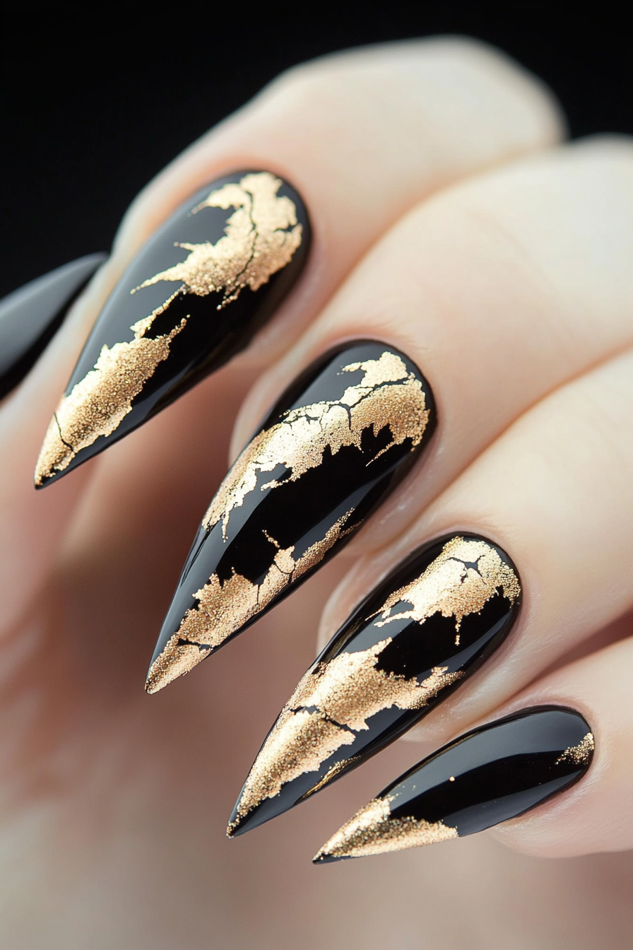 25. Black with Gold Leaf Accents (Stiletto Nail Design Ideas) - Stiletto Nail Design Ideas