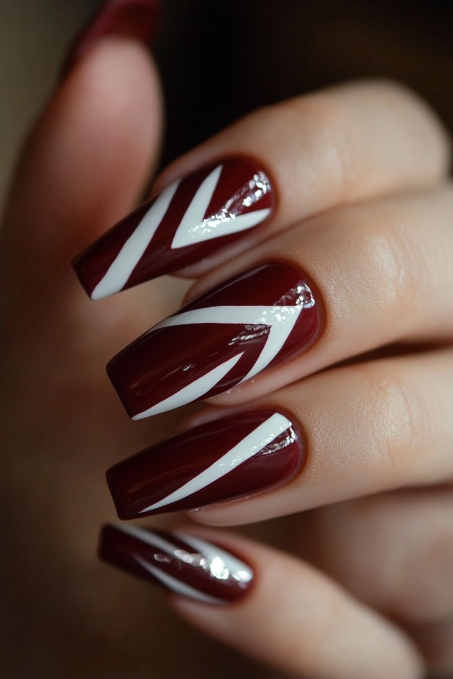 18. Burgundy and White Chevron Stripes (Long Nail Design Ideas) - Long Nail Design Ideas