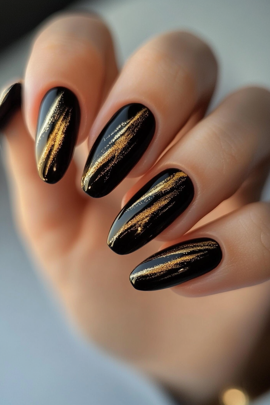 26. Gold Streaks on Matte Black (Black And Gold Nail Design Ideas) - Black And Gold Nail Design Ideas