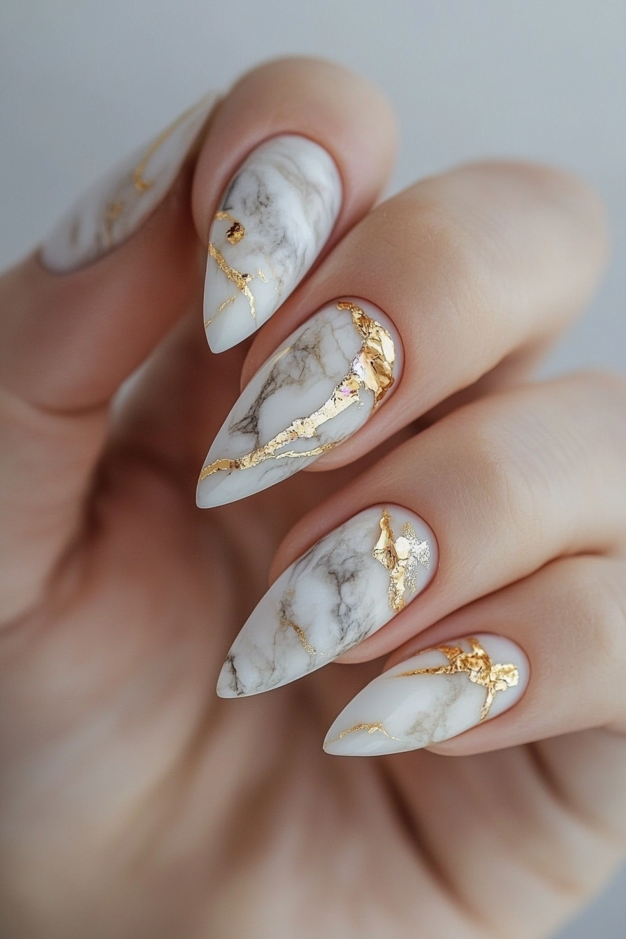13. Gilded Marble Accents (Oval Nail Design Ideas) - Oval Nail Design Ideas