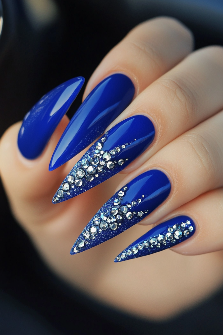 14. Stiletto Blue with Rhinestone Accents (Royal Blue Nail Design Ideas) - Royal Blue Nail Design Ideas