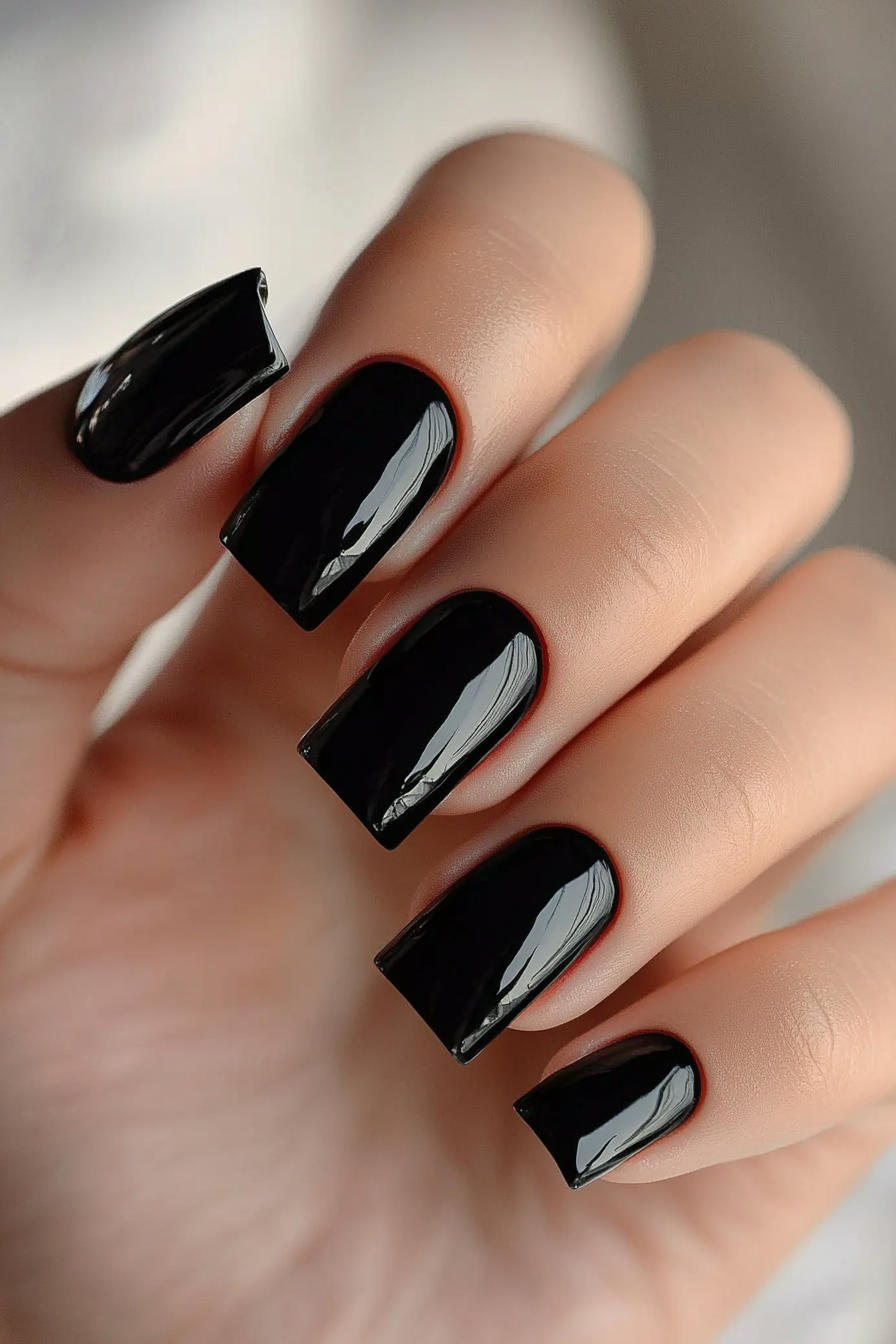 23. Sleek Silhouette (Short Black Nail Design Ideas) - Short Black Nail Design Ideas