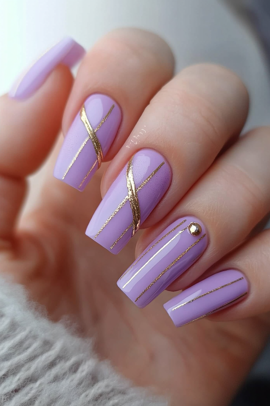 7. Soft Lilac & Gold Stripes (Short Coffin Nail Design Ideas) - Short Coffin Nail Design Ideas