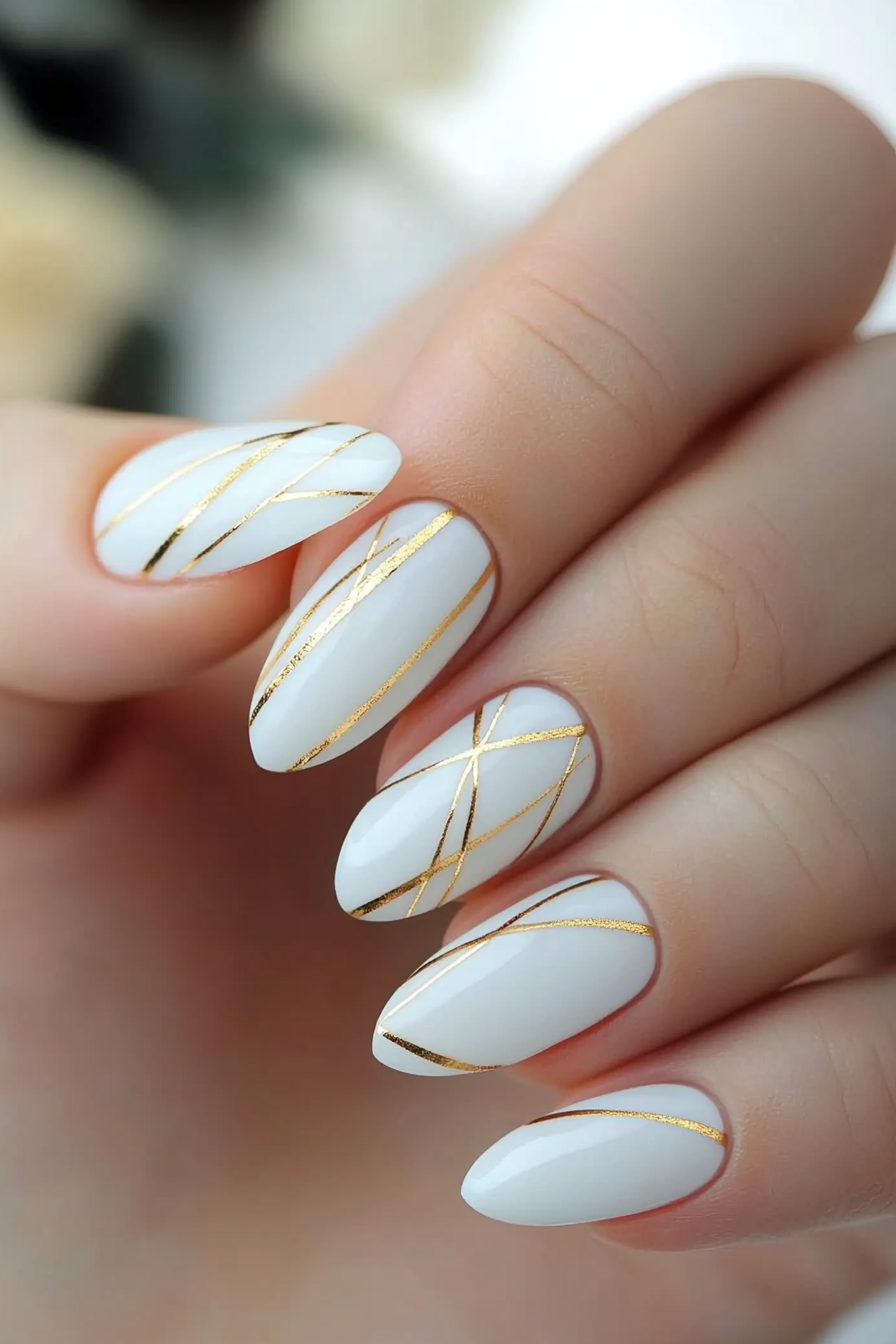 19. White Nails with Gold Lining (White And Gold Nail Design Ideas) - White And Gold Nail Design Ideas