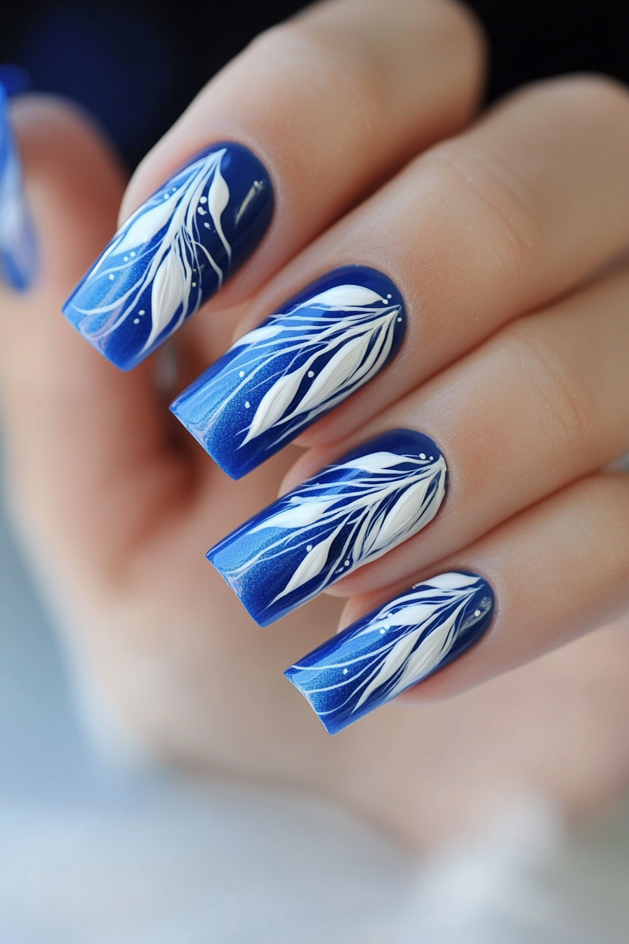 27. Feathered Beauty (Blue And White Nail Design Ideas) - Blue And White Nail Design Ideas